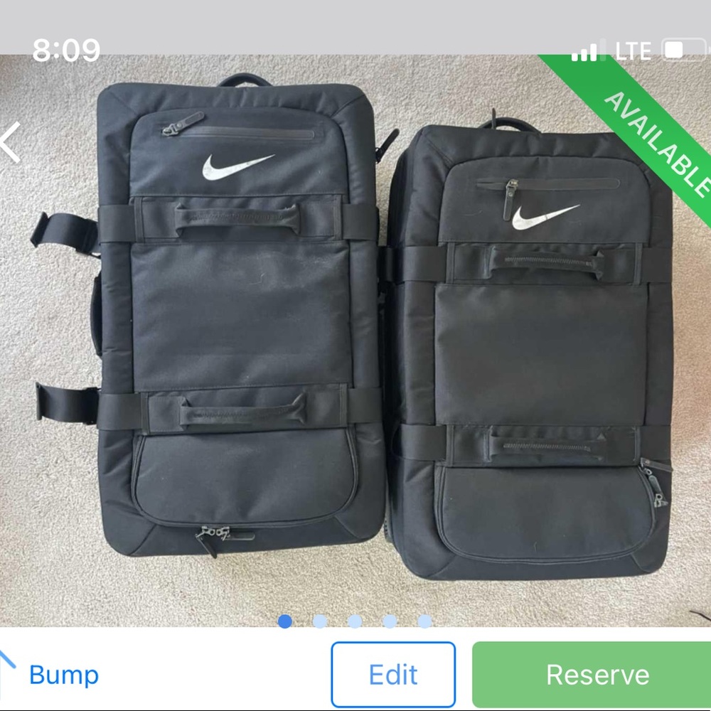 Sold!  2 Nike Departure Rolling Bags